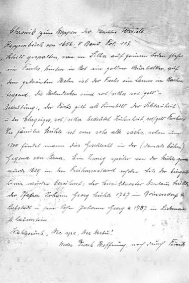 Handschriftlicher Brief, schwarze Schrift auf weiß-grauem Papier.