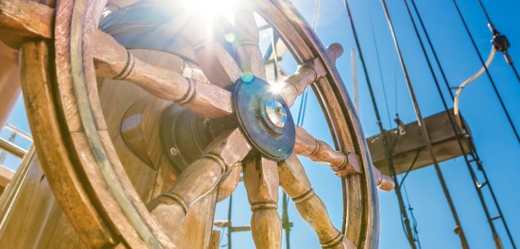 Wooden steering wheel of a sailing ship