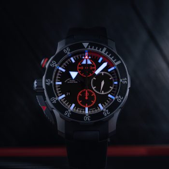 Night shot of the S.A.R. pilot's chronograph with luminous hands and indices.