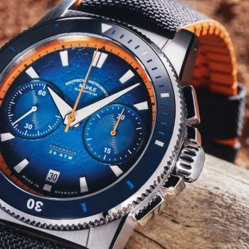 Close-up of the Sportivo Active Chronograph lying on a branch